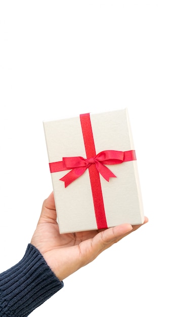 Man holding a silver gift box