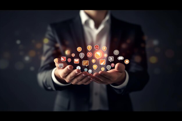 A man holding a small screen with icons on it.