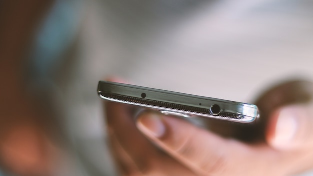 A man Holding Smartphone On Hand