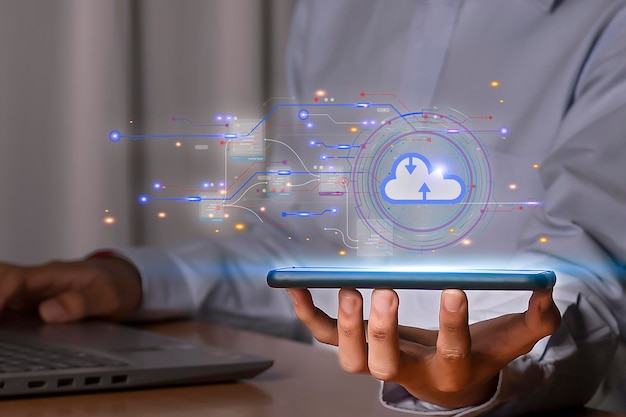 A man holding a tablet with a cloud icon on it