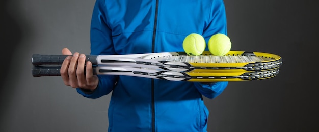 Man holding tennis ball and racket Sport Hobby