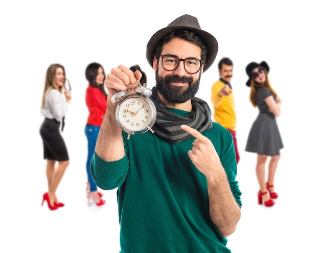 Photo man holding vintage clock