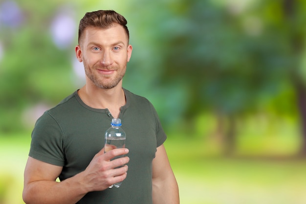 Man holding water bottle