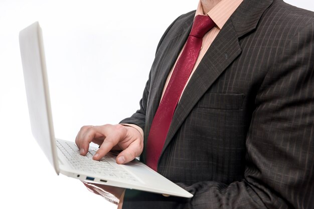 Man holding white laptop