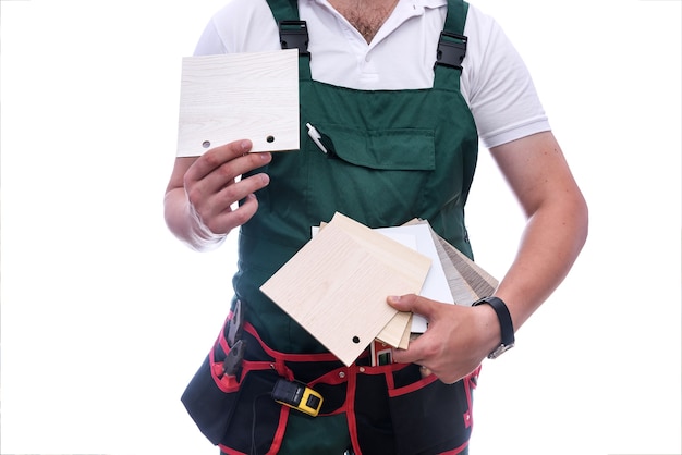 Man holding wooden sampler in hands close up