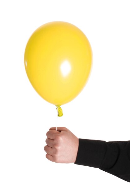 Man holding yellow baloonn