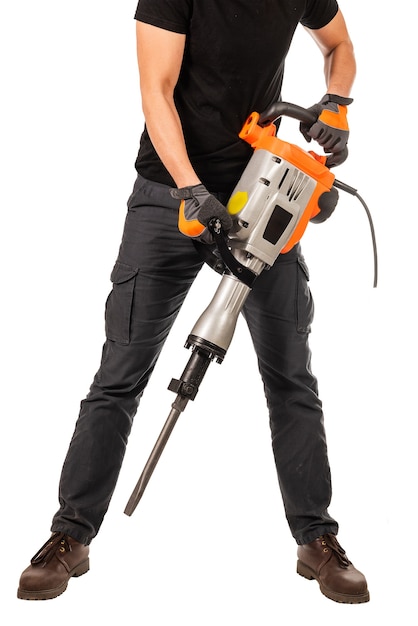 Man holds a jackhammer