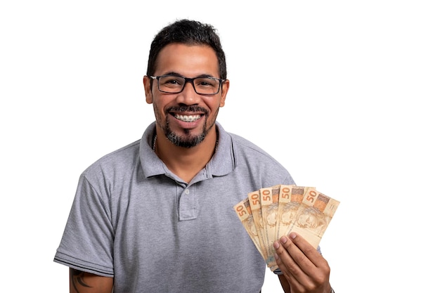 Man holds money Brazilian money BRL