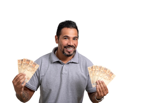 Man holds money Brazilian money BRL