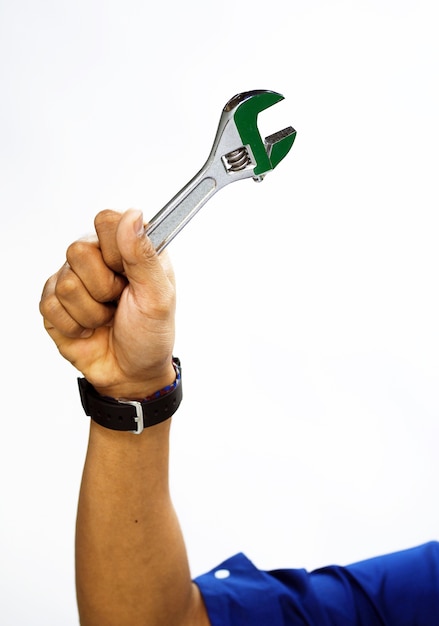 Photo man holds wrench tools isolated on white background. service and construction concept