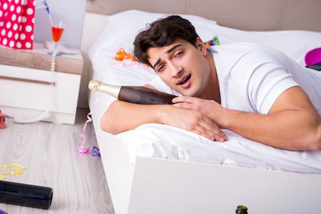 Man at home after heavy partying