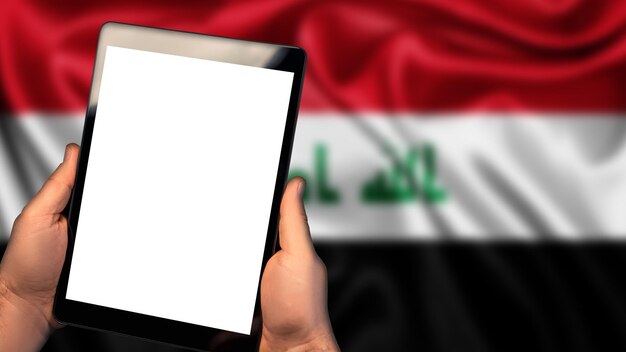 Man houdt tablet telefoon pc Vlag van Irak land op de achtergrond