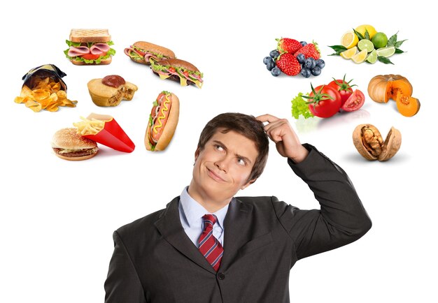 写真 さまざまな種類の食べ物とスーツを着た男
