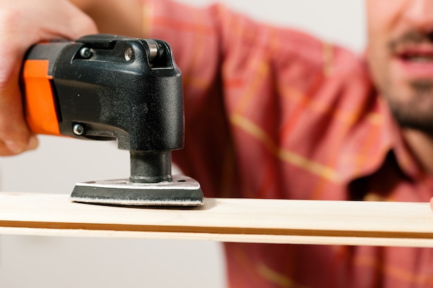 Man is grinding a plank