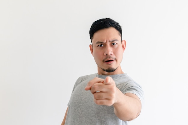 Man is pointing into the camera with an excited facial expression