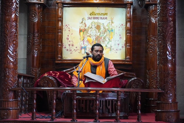 A man is praying hanumaan chalisha in temple