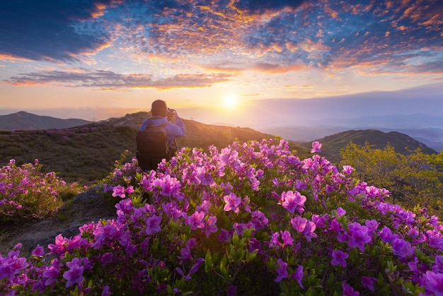 A man is taking the pictures of the first light in Morning and spring view Hapcheongun South Korea