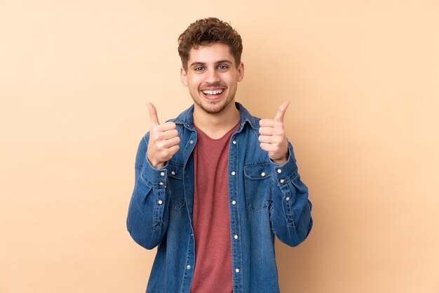 man isolated giving a thumbs-up gesture