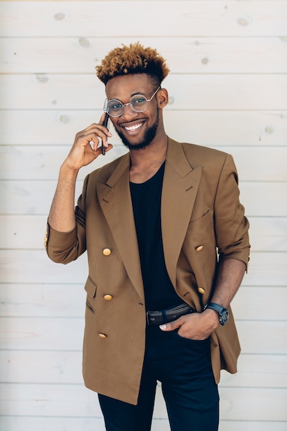 Man in jacket talking on phone