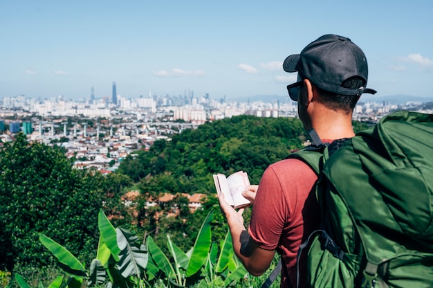 Man in the jungle with passport