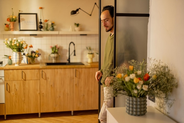 Man in kitchen interior