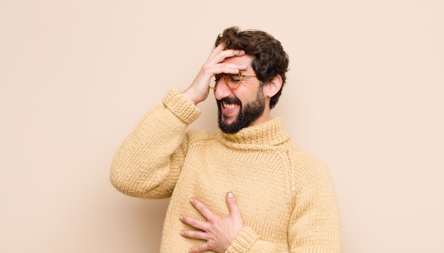 Photo man laughing out loud at some hilarious joke, feeling happy and cheerful, having fun