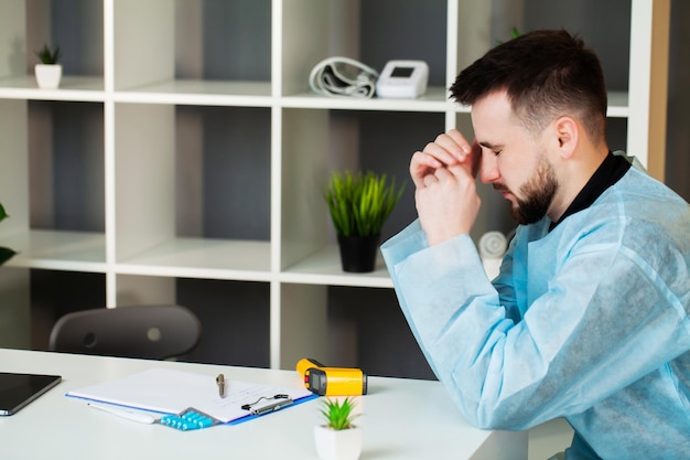 Man learns about the disappointing diagnosis in the doctor's office.