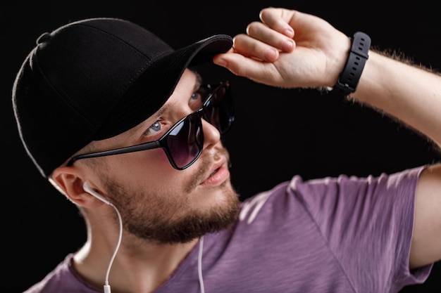 The man listening to music in headphones