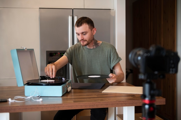 Man listening some music from a vinyl record