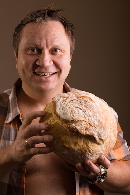 A man and a loaf of bread. human emotions