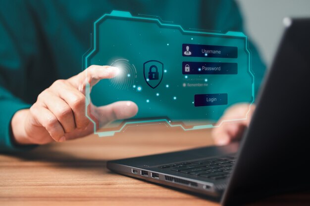 コンピューターの指紋スキャン技術を使用した男性のログイン。