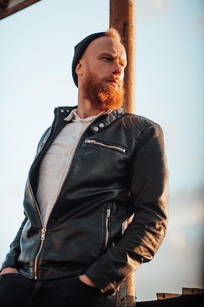 Man looking at camera against sky