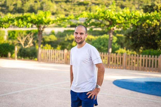 Man looking at camera in sportswear