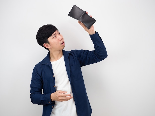 Man looking for money at his wallet sad at face poor man concept on white background