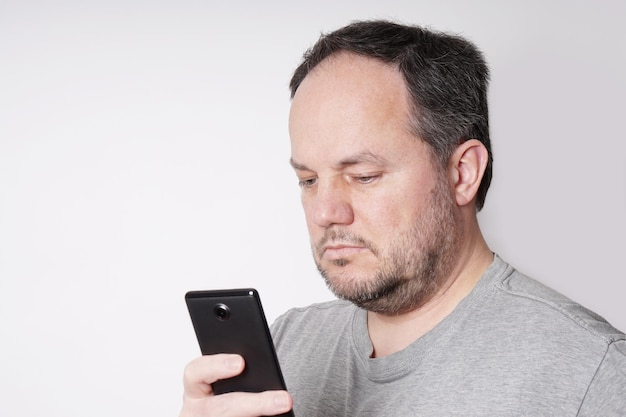 Man looking at smart phone