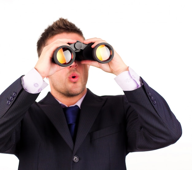 man looking through binoculars surprise