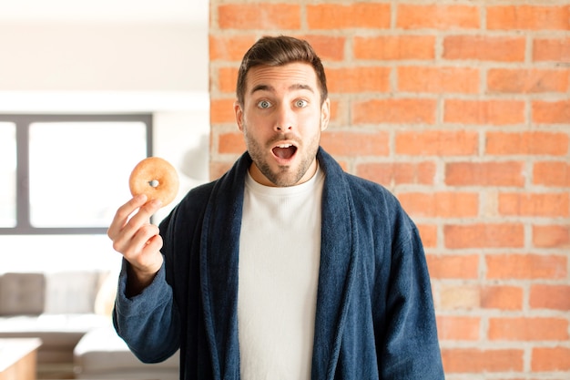 Man looking very shocked or surprised, staring with open mouth saying wow