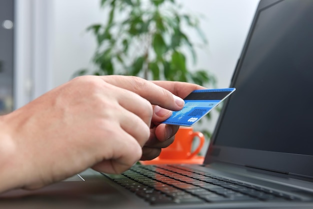 man makes a purchase on internet