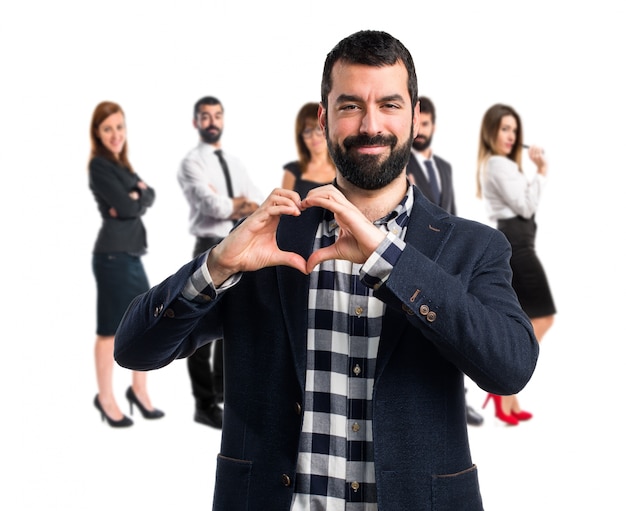 Man making a heart with his hands