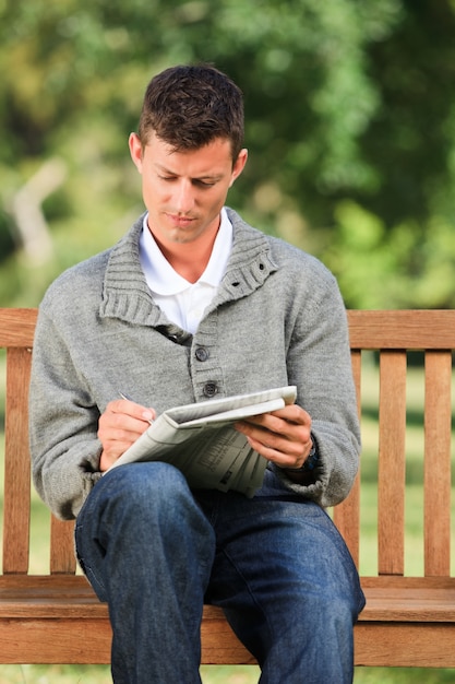 Man making his crossword 