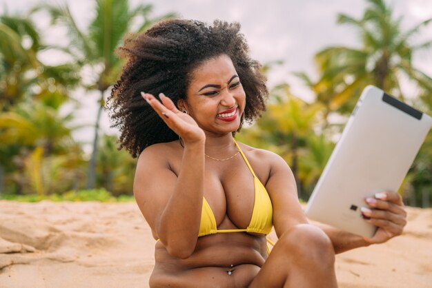 Man making a video call on summer vacation