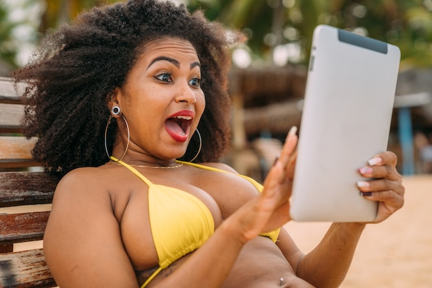 Man making a video call on summer vacation