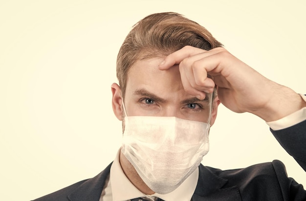 Man in medical protection mask isolated on white covid 19