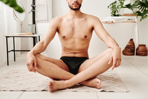 Man meditating in lotus position