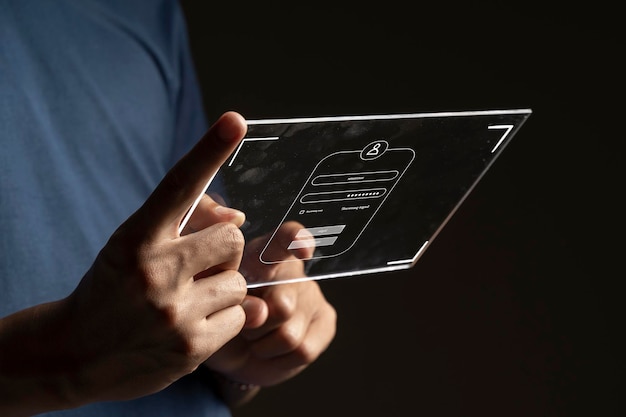 Man met futuristische tablet voert login formulier ui-element in op donkere achtergrond