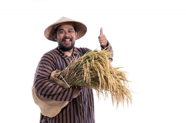 Man met Javaanse traditionele lurik shirt met rijstkorrels