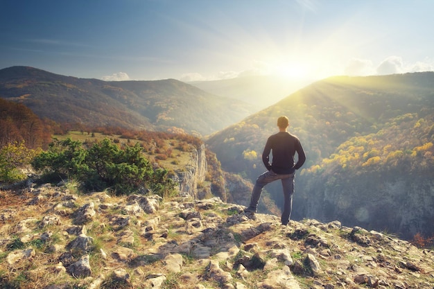 Man in mountain and sun shine