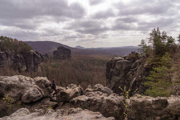 Man in the mountains Saxon Switzerland Germany Early spring