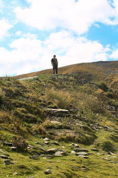 Man in the mountains traveling alone in the mountains