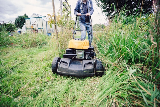 man mowing lawn